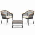 Conjunto de sillas de metal y cuerda con cojines beige y mesa de centro de hormigón